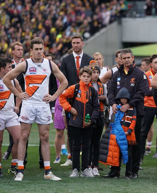 Tough day: (l-r) GWS forward Jeremy Cameron and coach Leon Cameron during the grand final presentations on Saturday. Picture: Scott Barbour/The Age