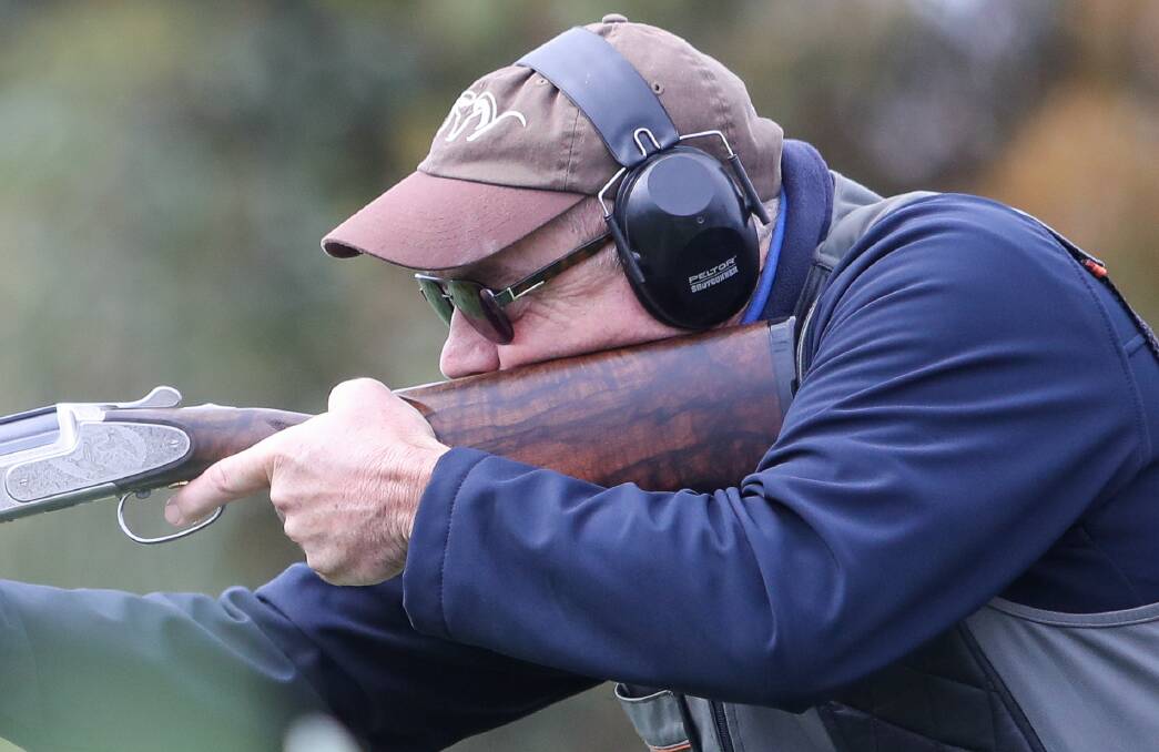 EYES ON THE PRIZE: Seniors competitor Bill Fraser closes in on his clay target as wind blows at the Laang club. Pictures: Morgan Hancock
