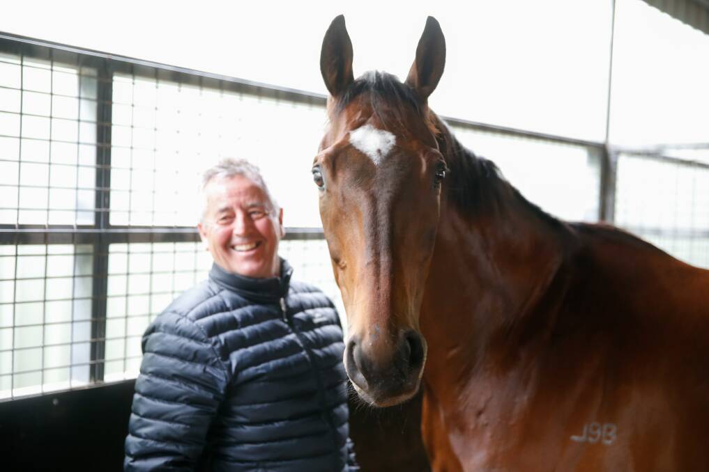 TEAM: Lindsey Smith at his stables in Warrnambool with Black Heart Bart. Picture: Mark Witte