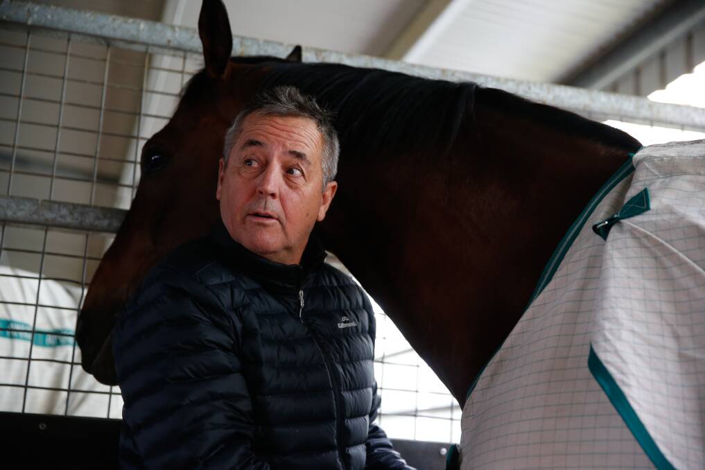 RACING PASSION: Lindsey Smith at his stables in Warrnambool with Black Heart Bart. Picture: Mark Witte 
