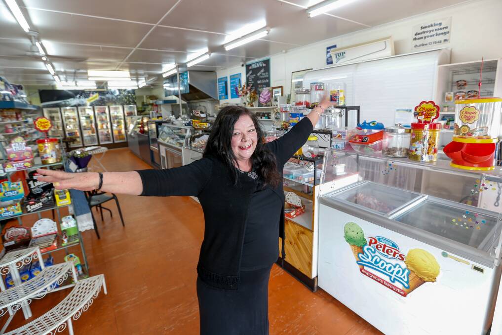 MEMORY LANE: Gail Stanley among the lollies, ice creams and hot food at her Cramer Street milk bar, which have a been popular among both young and old. Picture: Anthony Brady