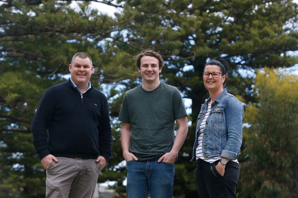 Support: Brophy Youth transitions program operations manager Geoff Wake, Portland's Lachie Sims and youth development coach Briony Harrison. Picture: Mark Witte