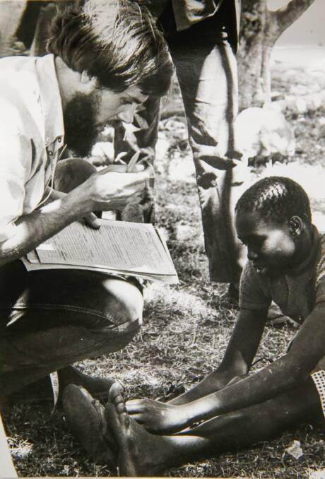 FLASHBACK: Bore Hoekstra under a tree taking a patient history in Swahili in Kenya during the mid-1970s. 