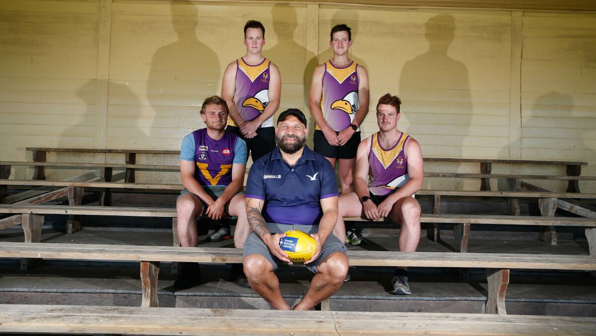 Port Fairy players Andy McMeel, Colin Harwood, Eddie Purvis and Kaine Mercovich with new coach Winis Imbi. Picture: Mark Witte