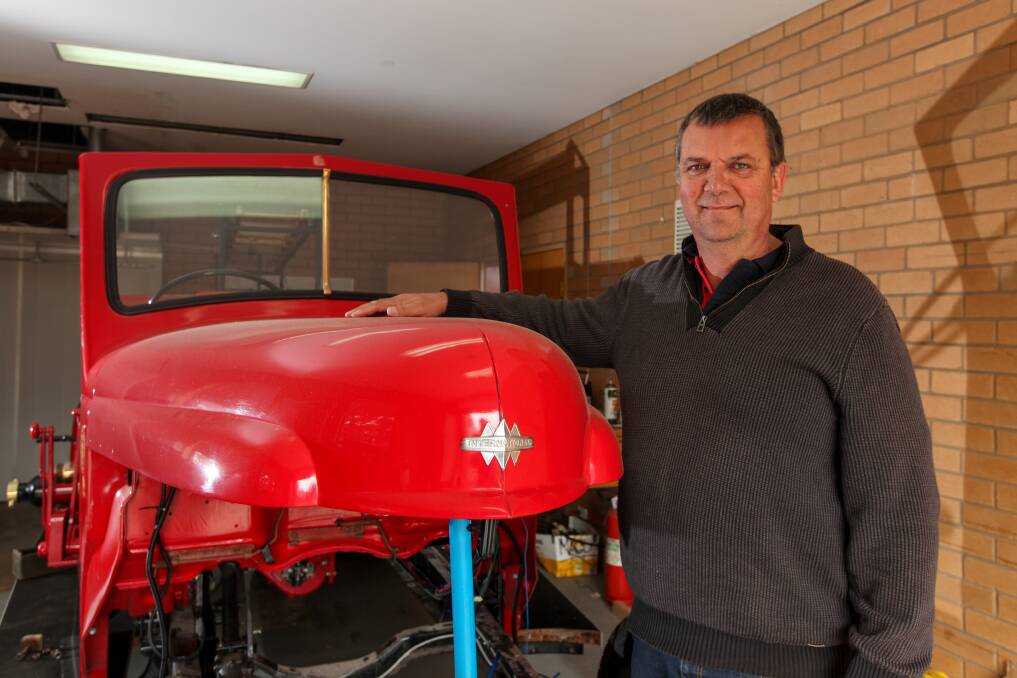 Still rolling: Retired Warrnambool CFA officer in charge Paul Marshall has been working with a group to restore a 1942 K4 International fire truck. Picture: Rob Gunstone