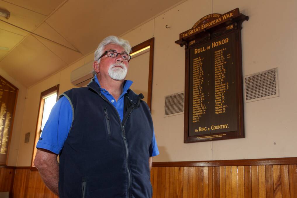 History restored: Heytesbury District Historical Society secretary Gavan Deppeler with the remade 'Roll of Honor' at the Scott's Creek/Cowley's Creek Community Hall.