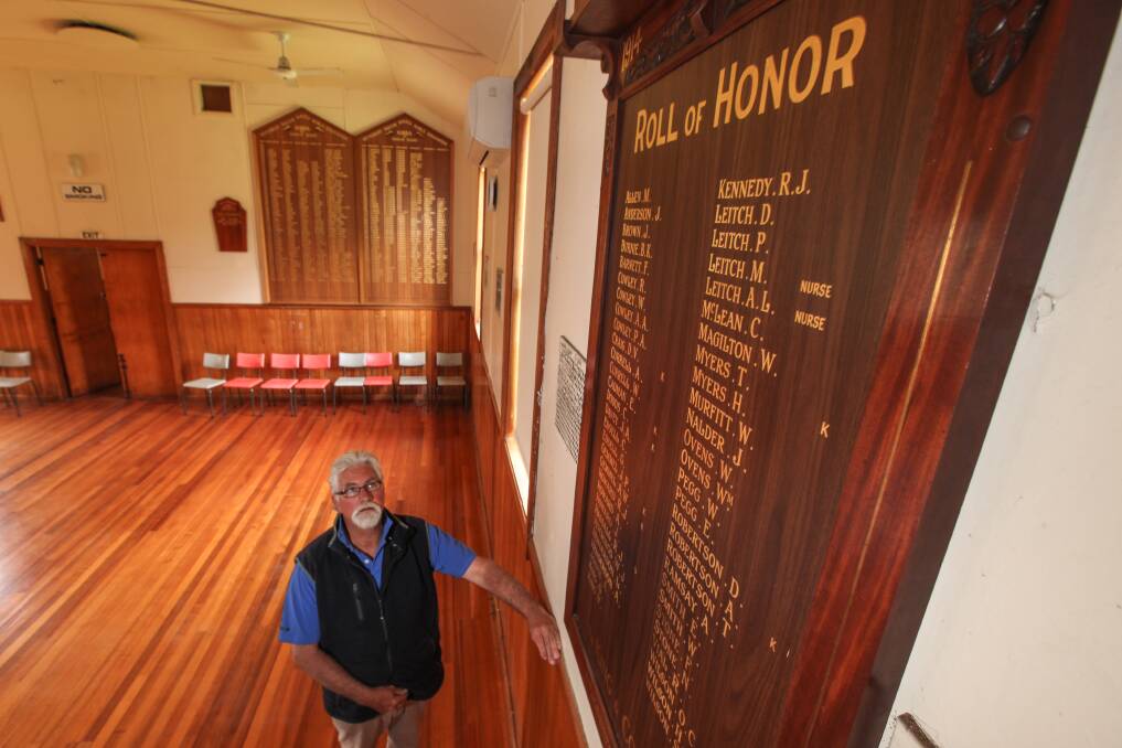 Returned: Heytesbury District Historical Society secretary Gavan Deppeler with the remade 'Roll of Honor' at the Scotts Creek/Cowleys Creek Community Hall.