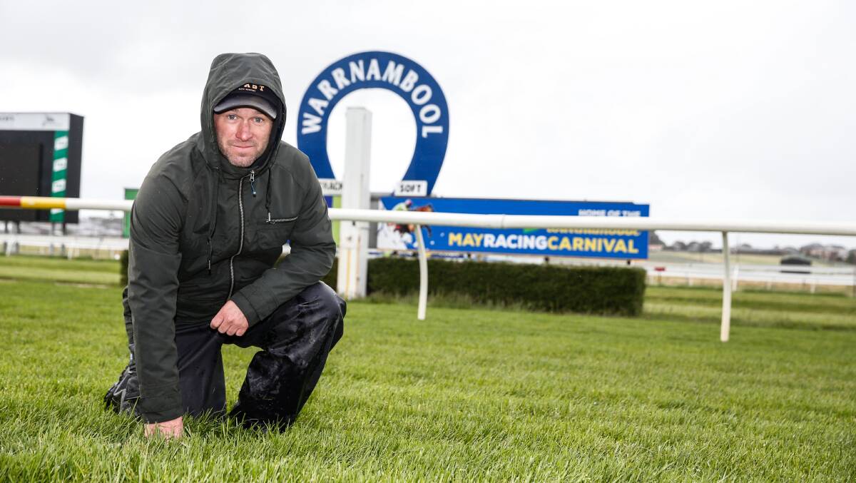 LAST-MINUTE CHECK: Track manager Daniel Lumsden is preparing the Warrnambool race course for tomorrow's races. Picture: Mark Witte
