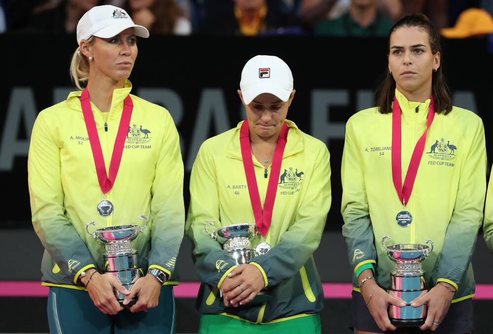 Missed out: Alicia Molik (from lefty), Ash Barty and Ajla Tomljanovic of Australia look on after being defeated in the 2019 Fed Cup Final tie between Australia and France at RAC Arena.