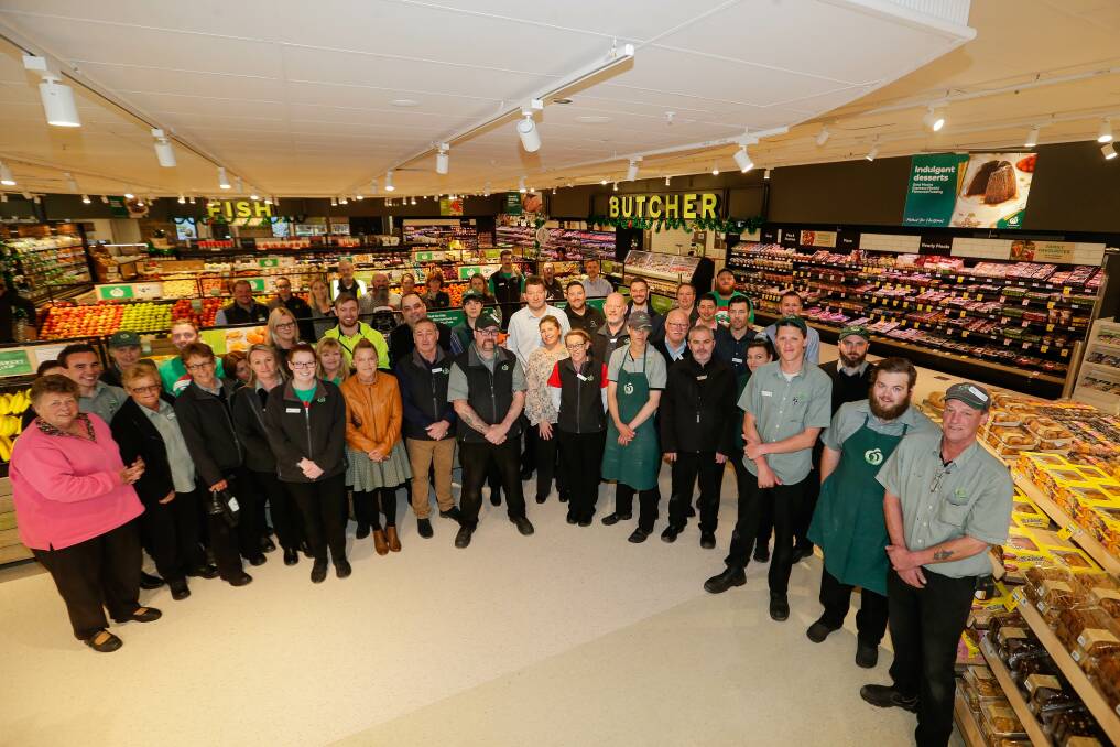 Team: Woolworths Warrnambool staff and customers celebrate the opening of the supermarket refurbishment. Picture: Anthony Brady