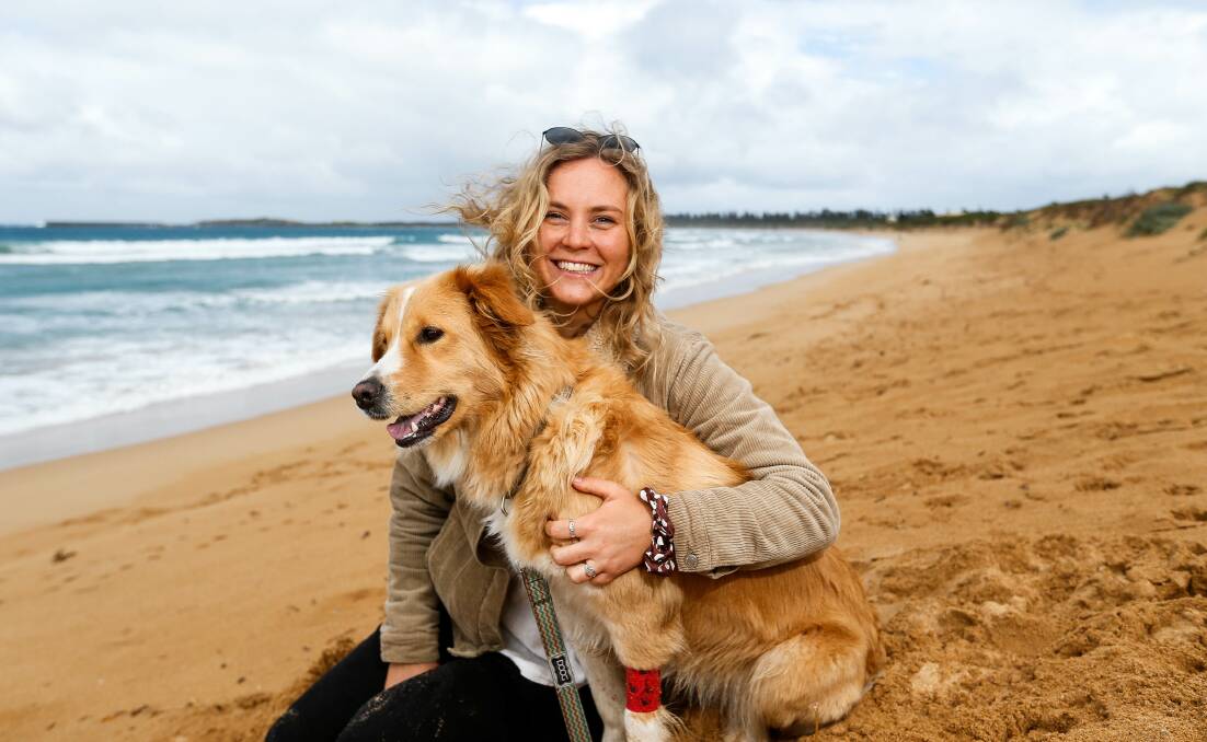 RECOVERING: Winnie spent the night at the vet after swallowing a number of bluebottles while walking along the beach with Chloe Deakin. Picture: Anthony Brady