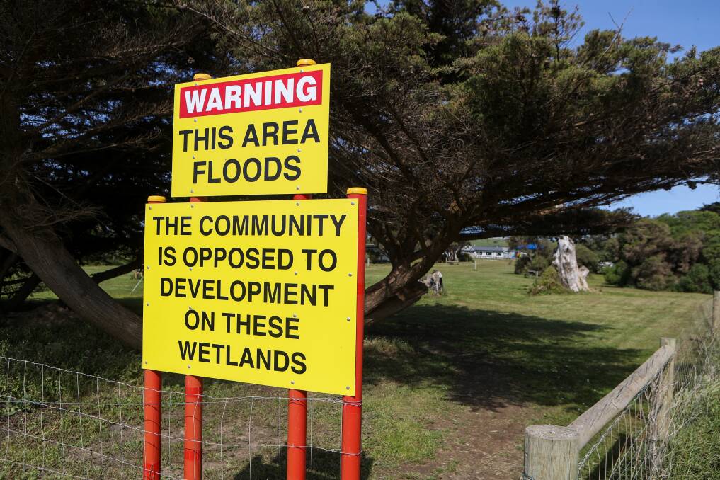 Flood area: Signage placed at the Princetown Recreation Reserve opposed to the new eco-resort development. Others argue that not everyone in the community is against the development. Picture: Rob Gunstone