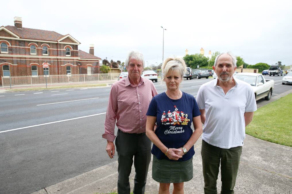 'Dangerous': Residents Brian and Karen Guyett and Michael Keyburn are upset that the council have decided to put a crossing out the front of their house rather than address the intersection of Merri and Fairy Streets. Picture: Mark Witte
