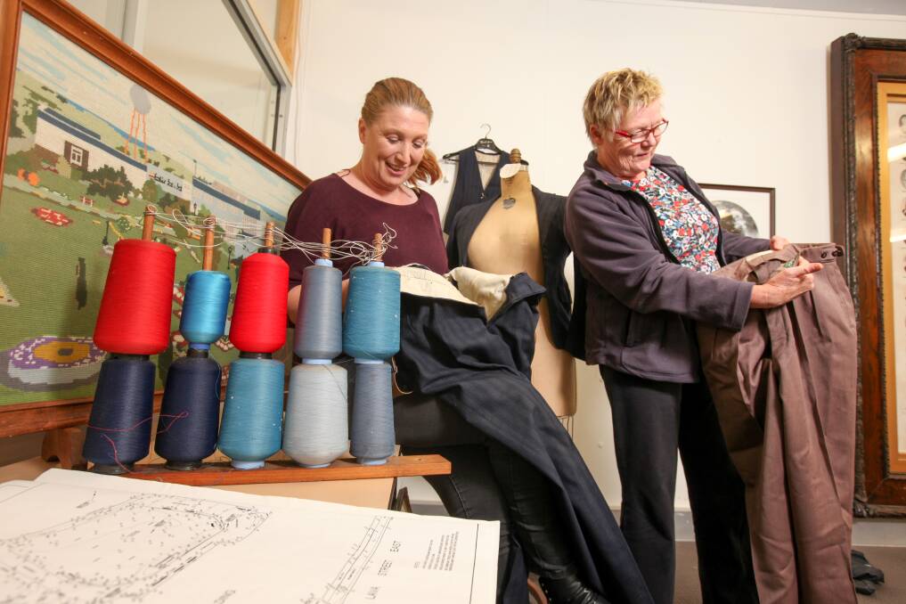 Test of time: Tonia Wilcox and Julie Eagles search through Fletcher Jones artefacts, at the Warrnambool Historical Society, before the FJ Living Museum event.