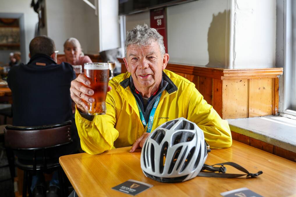 TOAST: Ian Sharrock enjoys a beer at the Stump after riding from Portland to Port Fairy. Picture: Morgan Hancock