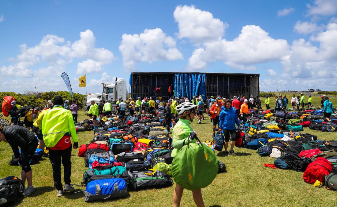UNLOADING: Riders unpack their gear from at Southcombe Caravan Park in Port Fairy. Picture: Morgan Hancock