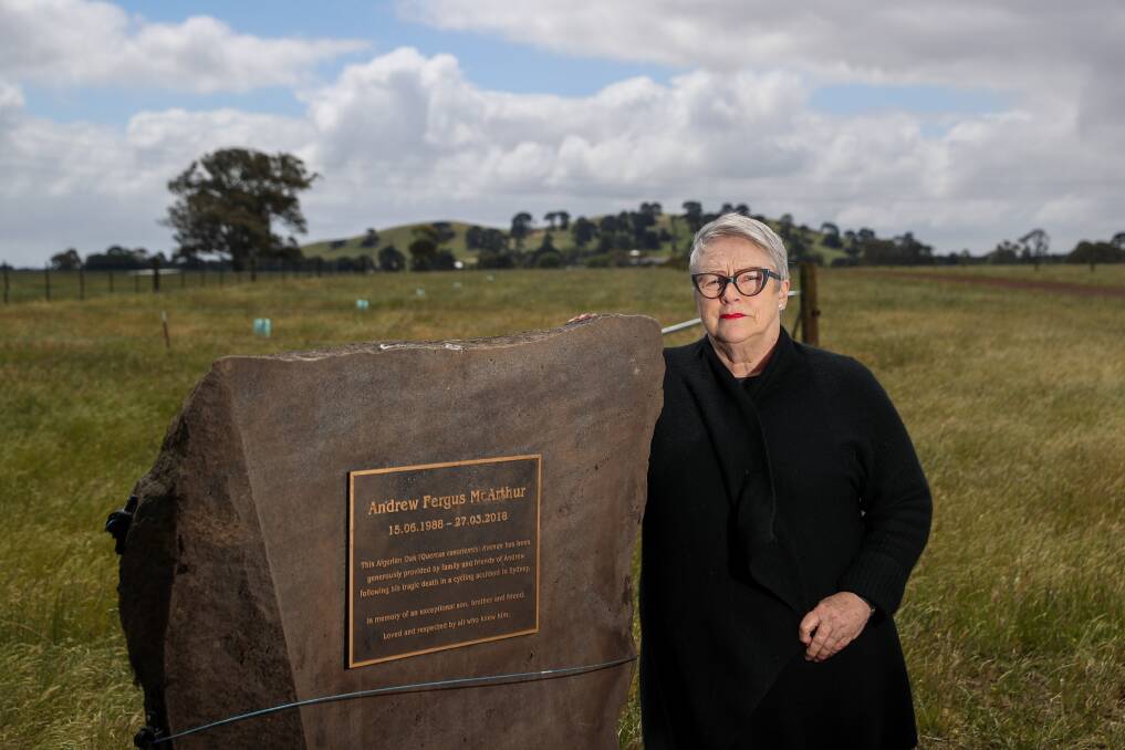 FOREVER IN THEIR HEARTS: Bev McArthur stands with a memorial stone for her son Andrew. Picture: Morgan Hancock