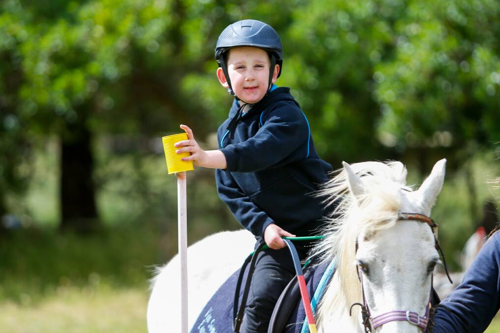 NEW ACTIVITIES: Henry Jackson, 7, on board Muffin throughout the new course, which his school mates built for the All Abilities Equestrian group. Picture: Morgan Hancock
