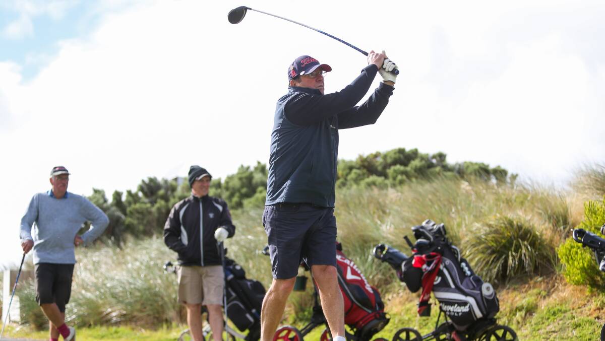 Still playing: Port Fairy's Phillip Laird tees off at Port Fairy Golf Links. The club's competitions are still on despite the coronavirus pandemic. Picture: Morgan Hancock