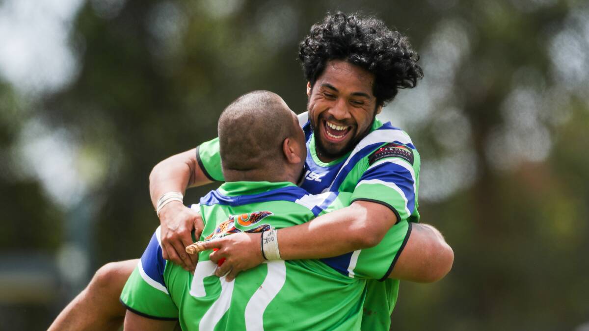 NEXT STEP: Warrnambool Raiders' Maeia Laga (front) celebrates the final try of the game with teammate Elijah Futi (back). Picture: Morgan Hancock