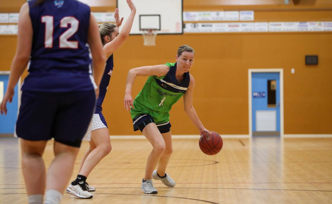 On the attack: Warrnambool Mermaids' coach Katie O'Keefe dribbles passed an opponent. Picture: Morgan Hancock