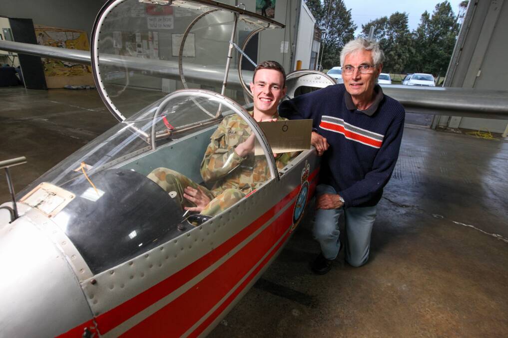 Soaring: Cadet Flight Sergenat Taylor Carlin, 18, and glider expert Mike Coates in the restored Blanik glider.