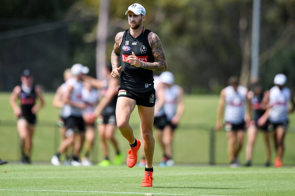 BIG LOSS: The injured Jeremy Howe will leave a hole in Collingwood's back line. Picture: Morgan Hancock