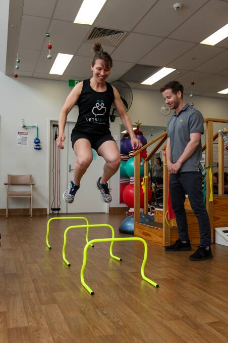 Physio: Karen Benson tests out her ACL after opting for treatment with exercise physiologist Steve Baudinette rather than surgery. Picture: Rob Gunstone