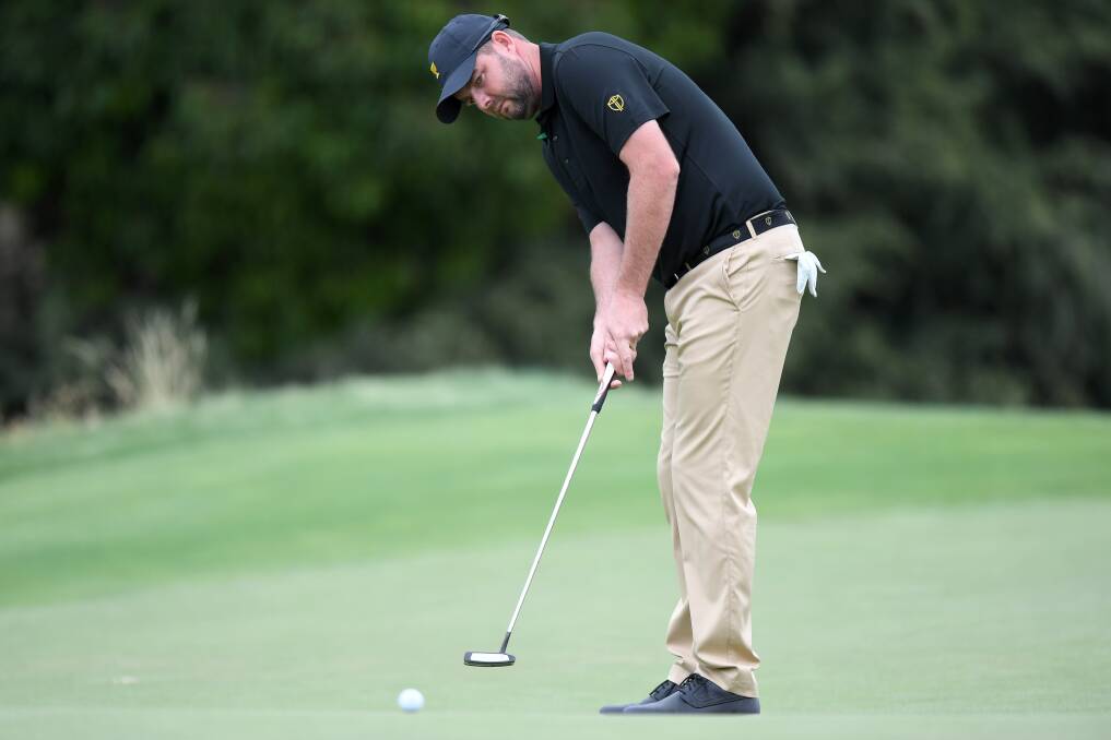 Marc Leishman plays a shot at the 13th hole. Picture: Morgan Hancock