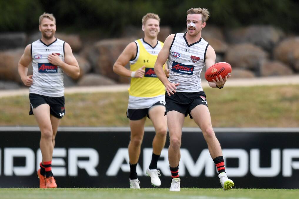 SMILE IF YOU'RE HAVING FUN: Essendon, including Marty Gleeson, is striving for another top-eight finish in 2020. Picture: Morgan Hancock