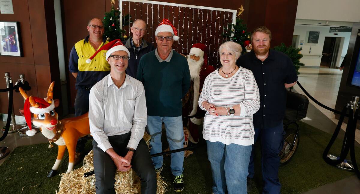 Tradition: Dennington Communtiy Association members Jason Warbuton, Craig Kelson, David Kelson, John Harris, Anne Boak and Ben Marsden will continue the work of Fonterra and take on the Christmas tradition. Picture Mark Witte