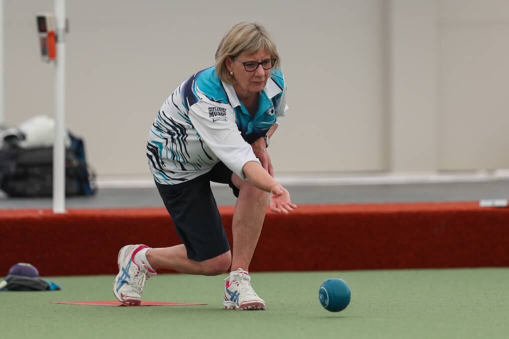Release: Port Fairy Gold's Pam Gibb rolls one on the green at City Memorial Bowls Club. Picture: Morgan Hancock