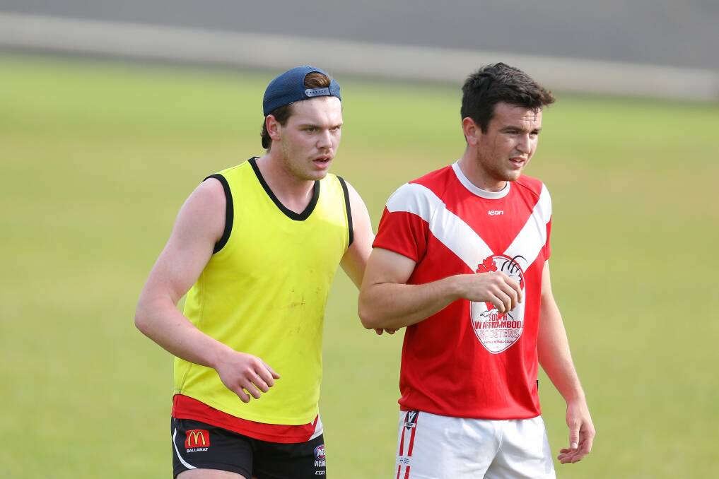 ON HOLD: South Warrnambool Roosters' Issac Thomas and Jack Johnstone at pre-season training. They now face a delayed start to the 2020 season. Picture: Mark Witte