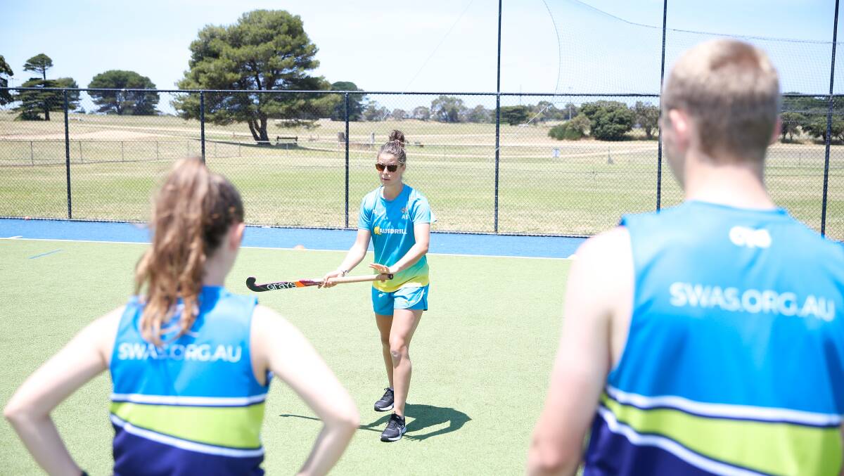 Mentor: Hockeyroo Sophie Taylor gives instructions to participants at the training session she ran in Warrnambool. Picture: Mark Witte