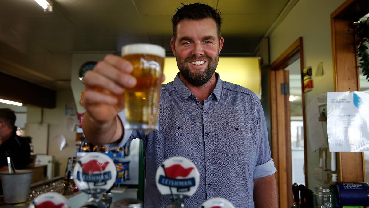 GOOD DROP: Marc Leishman pours a beer at the official launch of Leishman Lager at the Warrnambool Golf Club. Picture: Mark Witte
