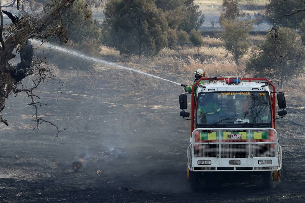 Emergency services respond to a bushfire on a farm at Dunkeld on Friday. Picture: Morgan Hancock