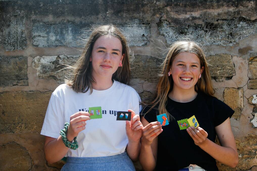 BUSY: Teenagers Ela Williams and Claudia Tutt are selling handmade jewellery as part of their Crossley Designs business. Picture: Anthony Brady