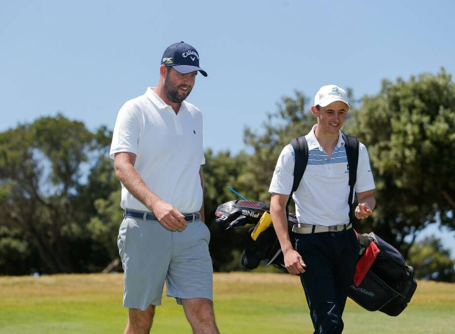 Valuable lessons: Warrnambool golfer Marc Leishman put on a clinic while back in his home town. Here he is with Hamilton's Daniel Battista, a South West Adademy of Sport athlete. Picture: Anthony Brady