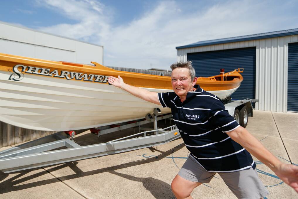 READY: Sue Knudsen from Port Fairy Heritage Boats Inc shows off the group's boat which will be a float in the Moyneyana Festival New Year's Eve parade in Port Fairy. Picture: Anthony Brady