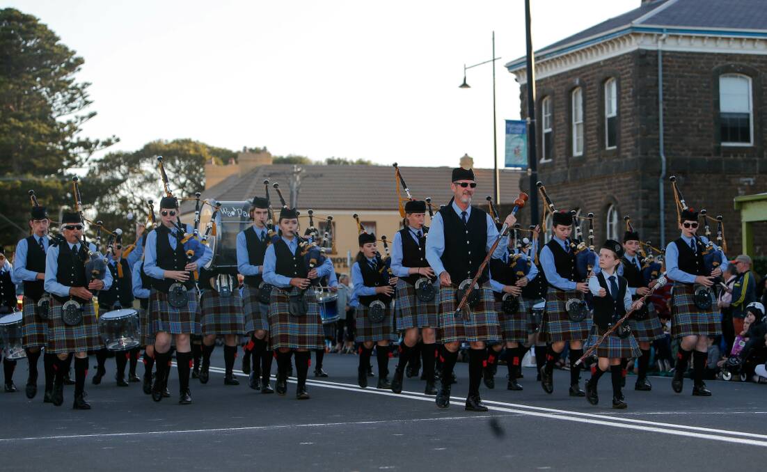 IN TUNE: The Warrnambool Pipes and Drum Band at the Moyneyana Festival parade in Port Fairy. They will be back in town for the Port Fairy Folk Festival. Picture: Anthony Brady
