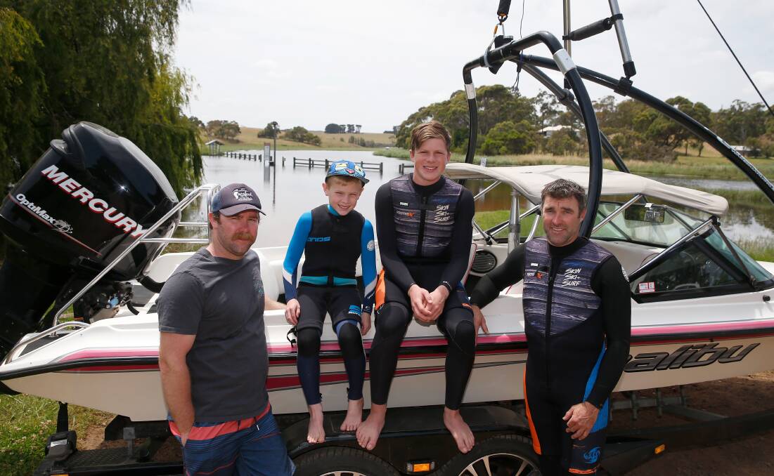 Family: Cobden-based barefoot water skiers Brett Roberts and his son Harry, 8, and Glenfyne's Peter Roberts and his son Thomas, 15, before training at Boggy Creek. Picture: Mark Witte