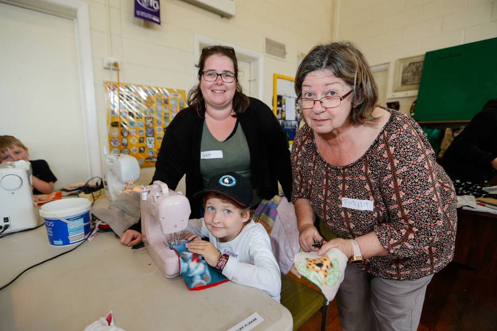 Tooram Scouts group in Warrnambool are making puches for wildlife. Pictured is scout Alexander McKay with his mother Laura McKay and grandmother Judith McKay. Picture: Anthony Brady