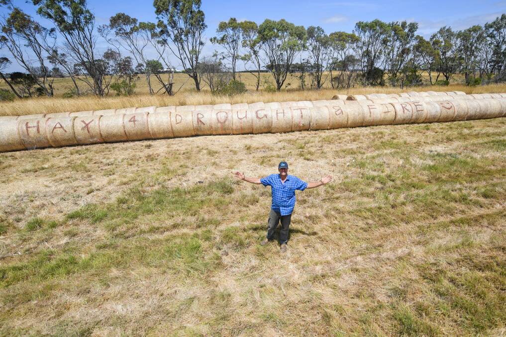 A worthy cause: Mr Stephens cut the 400 bales from council roadsides. Picture: Morgan Hancock