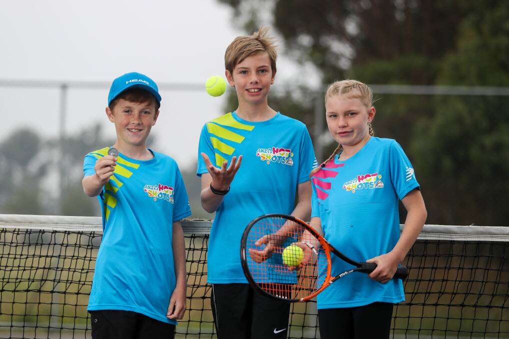 Big opportunity: Warrnambool's Tomm McKane, 11, Port Fairy's Archie Thomas, 9, and Koroit's Mia Murray, 11, ahead of this year's Australian Open. Picture: Morgan Hancock
