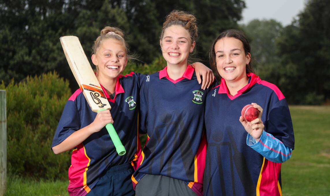 STEP UP: Hannah Rooke, 14, Ella Couch, 16, and Jorja Couch, 14, will play for Warrnambool at the first female country week. Picture: Morgan Hancock