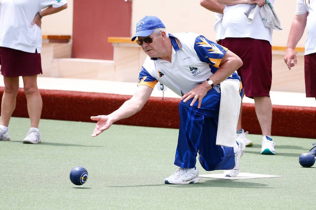 Rolling along: Warrnambool Blue's third Jon Clegg rolls one down the green. He's enjoying being part of the Warrnambool Bowls Club. Picture: Mark Witte