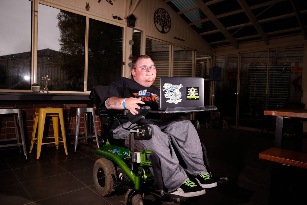Green laces initiative: Chris Gillin wears the green laces to raise awareness and start conversations around muscular dystrophy. Picture: Mark Witte