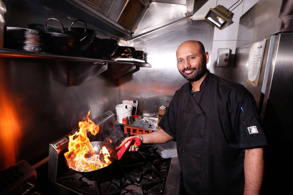 GRILL: Cactus Jam Owner and head chef Dayanand Shetty cooking some fajitas. Picture: Mark Witte