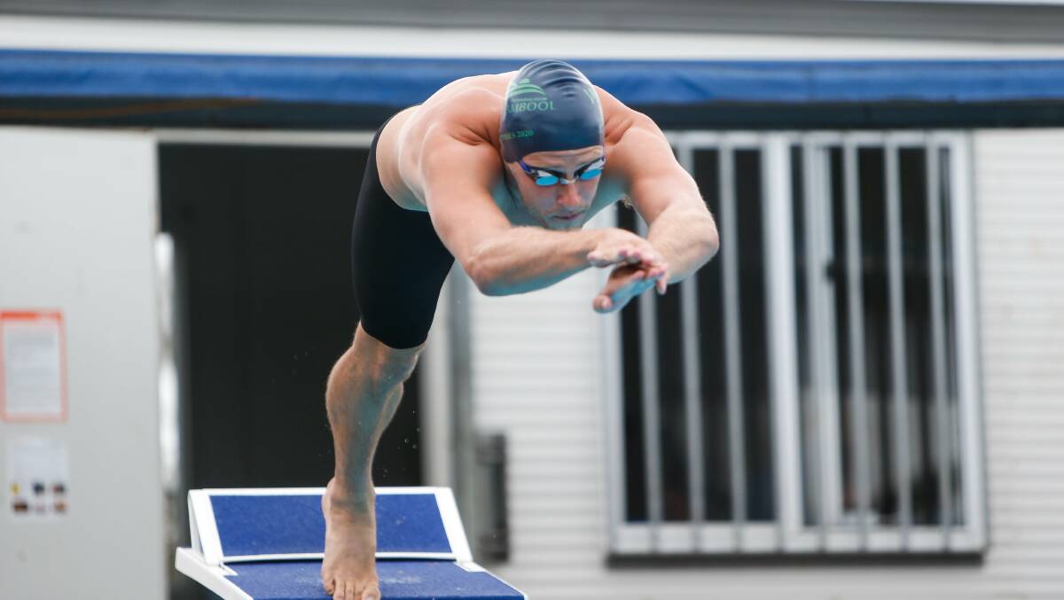 Diving in: Warrnambool Swimming Club's Jordan Logan at the Swimming Victoria country long course championships in Warrnambool on Saturday. Picture: Anthony Brady
