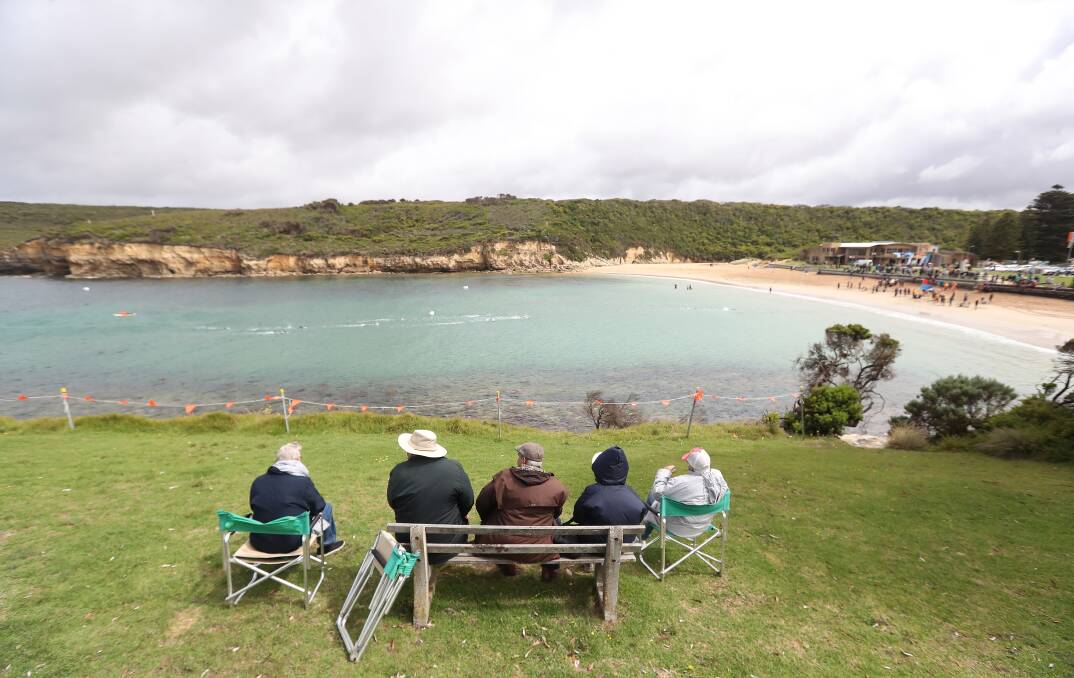 Spectators watch the Shipwreck Coast swim in Port Campbell earlier this year. Picture: Mark Witte